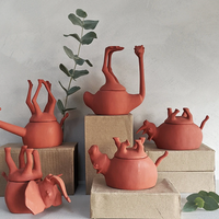 group shot of sleeping animal decor in brick colour